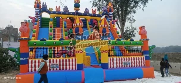 26x26 Ft 6-Lane Cartoon Castle Play Zone Bouncy with Climbing Nets – view 1