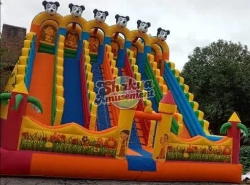 26x26 Ft 6-Lane Mickey Mouse Bouncy Slide – Orange Base & Castle Turrets – view 1